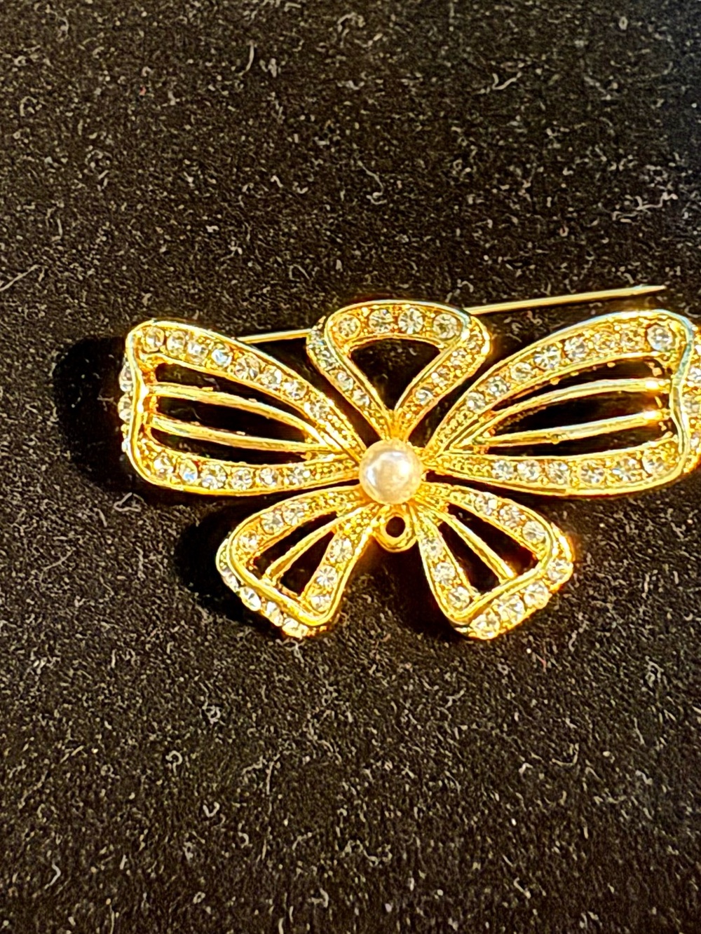 Gold Crystal Bow Brooch with Pearl Accent